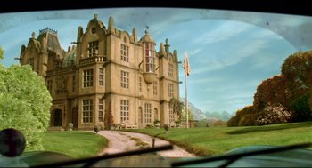 Movie still from “Wallace & Gromit: The Curse of the Were-Rabbit” (2005), directed by Nick Park – A painting of an old castle in the middle of a field; Extreme Wide shot, Low angle