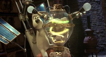 Movie still from “Wallace & Gromit: The Curse of the Were-Rabbit” (2005), directed by Nick Park – Wallace and gromit in a glass jar; Medium shot, Low angle