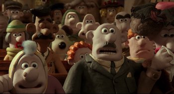 Movie still from “Wallace & Gromit: The Curse of the Were-Rabbit” (2005), directed by Nick Park – A bunch of cartoon characters with big eyes; Close Up shot, Over the shoulder angle