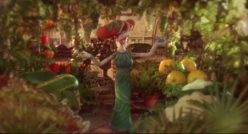 Movie still from “Wallace & Gromit: The Curse of the Were-Rabbit” (2005), directed by Nick Park – A statue of a woman in a green dress and a red hat; Wide shot, High angle
