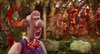 Movie still from “Wallace & Gromit: The Curse of the Were-Rabbit” (2005), directed by Nick Park – A cartoon character with a red bow tie; Close Up shot, Over the shoulder angle