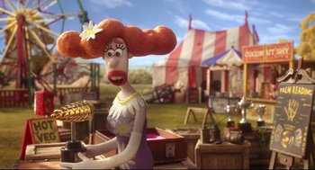 Movie still from “Wallace & Gromit: The Curse of the Were-Rabbit” (2005), directed by Nick Park – A woman with a big red hair wig and a flower in her hair; Medium shot, Over the shoulder angle