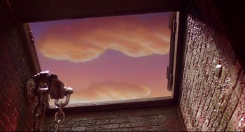 Movie still from “Wallace & Gromit: The Curse of the Were-Rabbit” (2005), directed by Nick Park – A view of the sky through a window; Extreme Close Up shot, Low angle