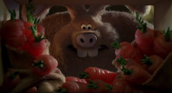 Movie still from “Wallace & Gromit: The Curse of the Were-Rabbit” (2005), directed by Nick Park – A stuffed animal surrounded by vegetables; Extreme Close Up shot, Over the shoulder angle
