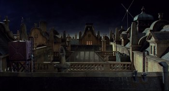 Movie still from “Wallace & Gromit: The Curse of the Were-Rabbit” (2005), directed by Nick Park – A dark scene of a building with a fire hydrant in front of it; Extreme Wide shot, High angle