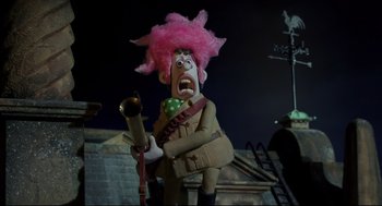 Movie still from “Wallace & Gromit: The Curse of the Were-Rabbit” (2005), directed by Nick Park – A pink haired cartoon character is holding a microphone; Medium shot, Low angle