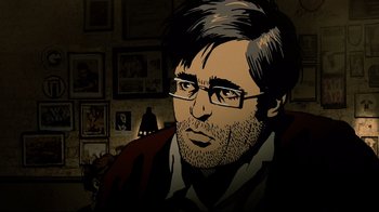 Movie still from “Waltz with Bashir” (2008), directed by Ari Folman – A man with a beard wearing glasses and a jacket; Close Up shot, Low angle