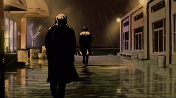 Movie still from “Waltz with Bashir” (2008), directed by Ari Folman – A couple of people walking down a street at night; Wide shot, Low angle