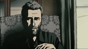 Movie still from “Waltz with Bashir” (2008), directed by Ari Folman – A man sitting in a chair with a beard; Close Up shot, Low angle