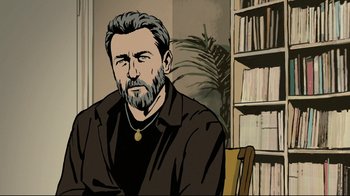 Movie still from “Waltz with Bashir” (2008), directed by Ari Folman – A man with a beard sitting in front of a book shelf; Medium shot, High angle