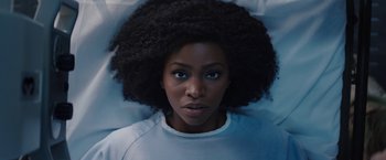 Movie still from “WandaVision” (2021), directed by Matt Shakman – A person laying down; Close Up shot, Overhead angle