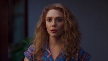 Movie still from “WandaVision” (2021), directed by Matt Shakman – A person with long hair; Close Up shot, Over the shoulder angle