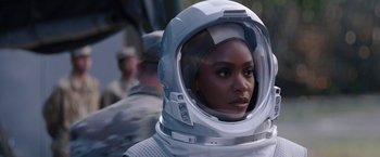 Movie still from “WandaVision” (2021), directed by Matt Shakman – A woman wearing a space suit and a helmet; Close Up shot, Over the shoulder angle