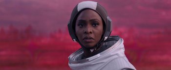 Movie still from “WandaVision” (2021), directed by Matt Shakman – A woman in a space suit is looking at the camera; Close Up shot, Over the shoulder angle
