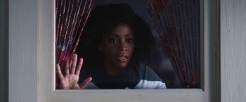 Movie still from “WandaVision” (2021), directed by Matt Shakman – A woman looking out of a window at night; Close Up shot, Over the shoulder angle