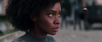 Movie still from “WandaVision” (2021), directed by Matt Shakman – A person with yellow eyes; Close Up shot, Over the shoulder angle