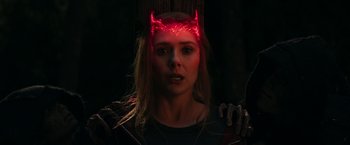 Movie still from “WandaVision” (2021), directed by Matt Shakman – A woman with a red light on her head; Close Up shot, Over the shoulder angle