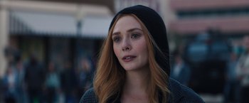 Movie still from “WandaVision” (2021), directed by Matt Shakman – A person wearing a hooded jacket; Close Up shot, Over the shoulder angle