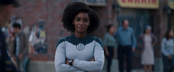 Movie still from “WandaVision” (2021), directed by Matt Shakman – A woman standing with her arms crossed; Close Up shot, Over the shoulder angle