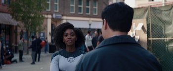 Movie still from “WandaVision” (2021), directed by Matt Shakman – A woman standing next to a man on a sidewalk; Medium shot, Over the shoulder angle