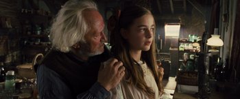 Movie still from “War Horse” (2011), directed by Steven Spielberg – An older man and a young girl are looking at each other; Close Up shot, Over the shoulder angle