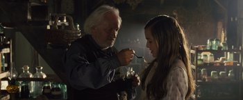 Movie still from “War Horse” (2011), directed by Steven Spielberg – An old man and a young girl eating food; Close Up shot, Over the shoulder angle