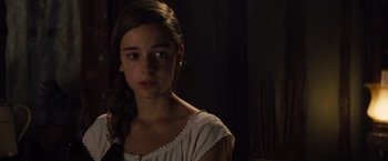Movie still from “War Horse” (2011), directed by Steven Spielberg – A young girl in a white dress looking at the camera; Close Up shot, Over the shoulder angle