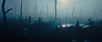 Movie still from “War Horse” (2011), directed by Steven Spielberg – A group of people standing on top of a dirt field; Extreme Wide shot, High angle