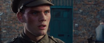 Movie still from “War Horse” (2011), directed by Steven Spielberg – A person wearing a uniform; Close Up shot, Low angle