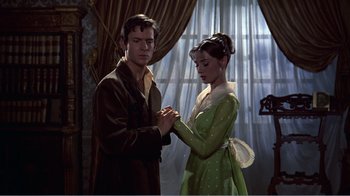Movie still from “War and Peace” (1956), directed by King Vidor – A man and a woman standing next to each other; Medium shot, Over the shoulder angle