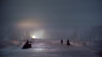 Movie still from “War and Peace” (1956), directed by King Vidor – A group of people riding skis on top of a snow covered slope; Extreme Wide shot, High angle