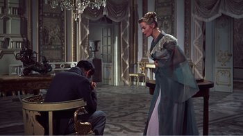 Movie still from “War and Peace” (1956), directed by King Vidor – A man and a woman are in a room; Wide shot, Over the shoulder angle