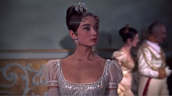 Movie still from “War and Peace” (1956), directed by King Vidor – A woman in a white dress with a tiara on her head; Close Up shot, Low angle