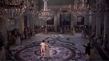 Movie still from “War and Peace” (1956), directed by King Vidor – A couple of people that are dancing in a room; Extreme Wide shot, High angle