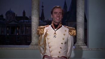 Movie still from “War and Peace” (1956), directed by King Vidor – A man dressed in a uniform with a medal around his neck; Medium shot, Low angle