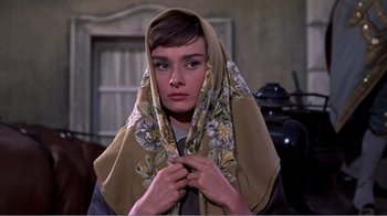 Movie still from “War and Peace” (1956), directed by King Vidor – A woman with a scarf around her neck; Close Up shot, Low angle