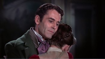 Movie still from “War and Peace” (1956), directed by King Vidor – A person hugging another person; Close Up shot, Over the shoulder angle