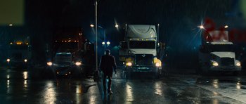 Movie still from “Water for Elephants” (2011), directed by Francis Lawrence – A man walking down the street at night; Wide shot, Low angle