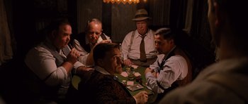 Movie still from “Water for Elephants” (2011), directed by Francis Lawrence – A group of men sitting at a table playing cards; Medium shot, High angle
