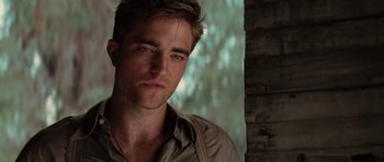 Movie still from “Water for Elephants” (2011), directed by Francis Lawrence – A person wearing a shirt; Close Up shot, Over the shoulder angle