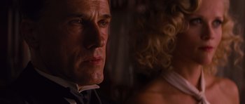 Movie still from “Water for Elephants” (2011), directed by Francis Lawrence – A person wearing a suit and tie; Close Up shot, Low angle