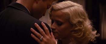 Movie still from “Water for Elephants” (2011), directed by Francis Lawrence – A man and a woman are kissing in a room; Close Up shot, Low angle