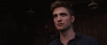 Movie still from “Water for Elephants” (2011), directed by Francis Lawrence – A person wearing a black shirt; Close Up shot, Low angle