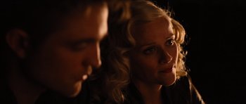 Movie still from “Water for Elephants” (2011), directed by Francis Lawrence – A man and a woman looking at something in the dark; Close Up shot, Over the shoulder angle