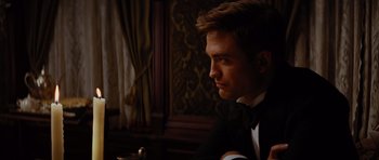 Movie still from “Water for Elephants” (2011), directed by Francis Lawrence – A person wearing a tuxedo; Close Up shot, Over the shoulder angle