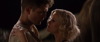 Movie still from “Water for Elephants” (2011), directed by Francis Lawrence – A man and a woman face to face in the dark; Close Up shot, Low angle