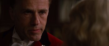 Movie still from “Water for Elephants” (2011), directed by Francis Lawrence – A person wearing a suit and tie; Close Up shot, Over the shoulder angle