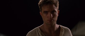 Movie still from “Water for Elephants” (2011), directed by Francis Lawrence – A person wearing a necklace; Close Up shot, Low angle