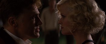 Movie still from “Water for Elephants” (2011), directed by Francis Lawrence – A man and a woman face to face in front of a crowd; Close Up shot, Low angle