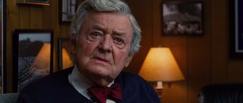 Movie still from “Water for Elephants” (2011), directed by Francis Lawrence – An older man wearing a red bow tie; Close Up shot, Over the shoulder angle